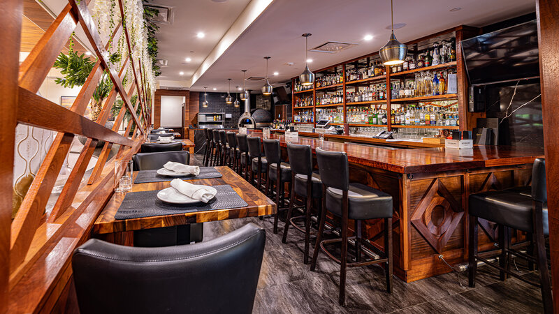 Bar area with stool and high top seating