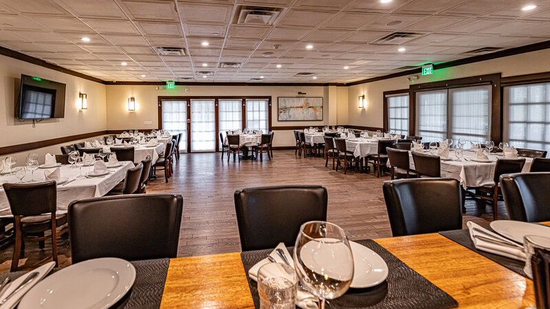 Bright room with many set tables