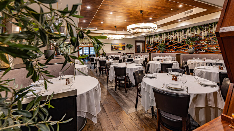 Dining room with many set tables