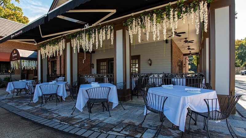 Outdoor dining area with set tables