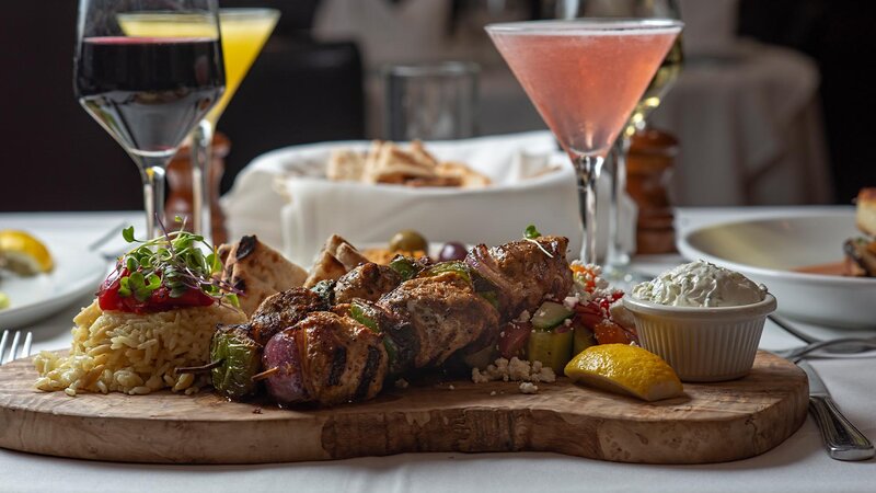 Chicken kebab entree with side of rice