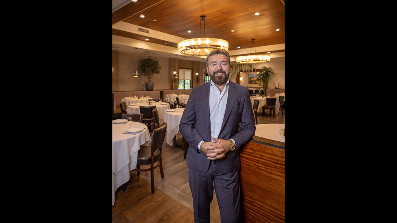 Aurora owner in dining room